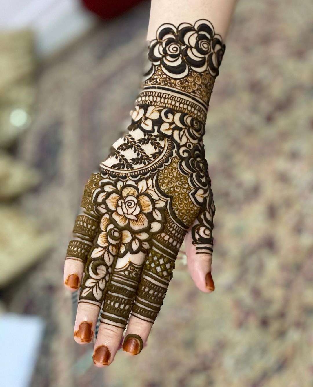 Back hand black henna mehndi design