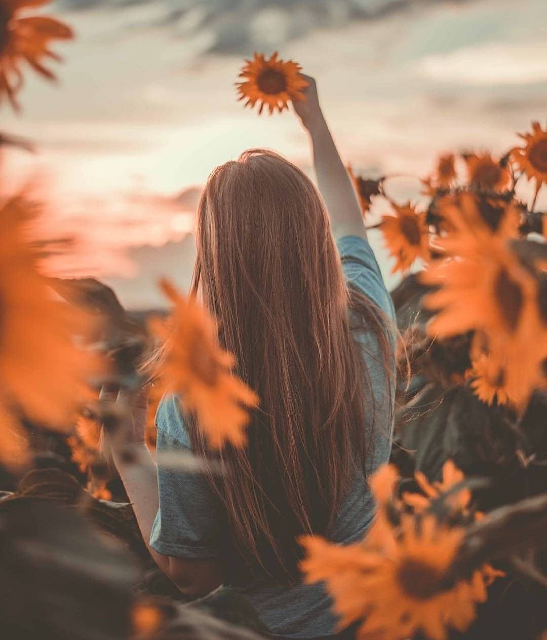 Girl And Sunflower